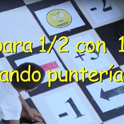 Comparar un medio y un cuarto usando puntería Comparar un medio y un cuarto usando puntería